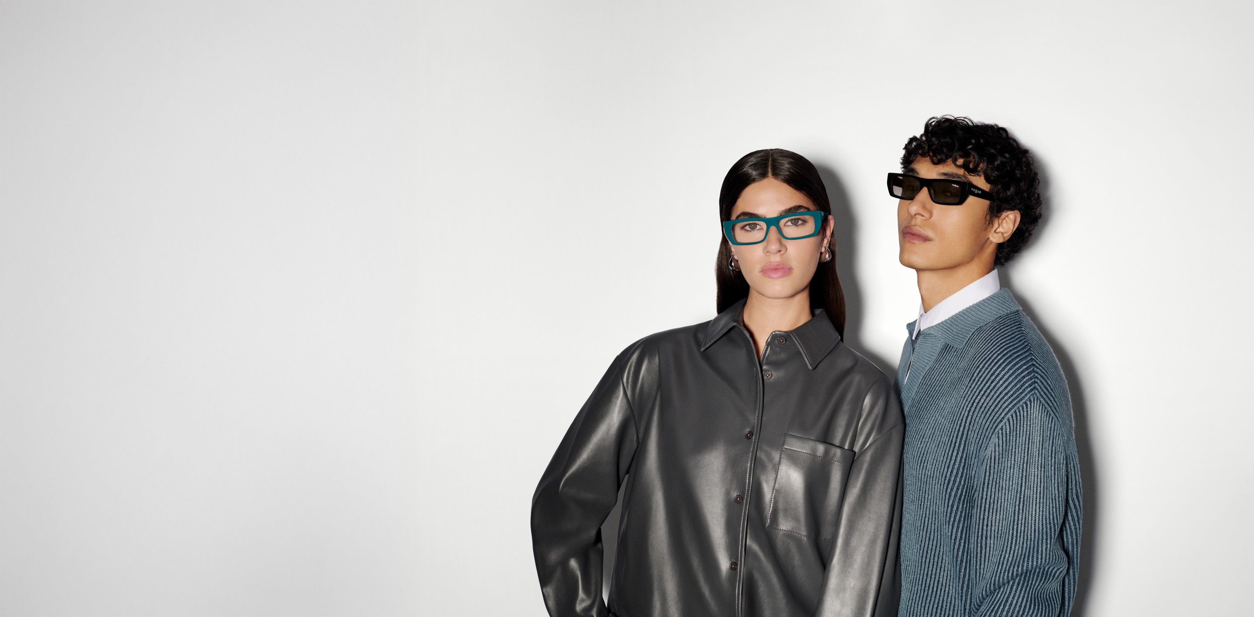 Two Vogue Eyewear models wearing eyewear
